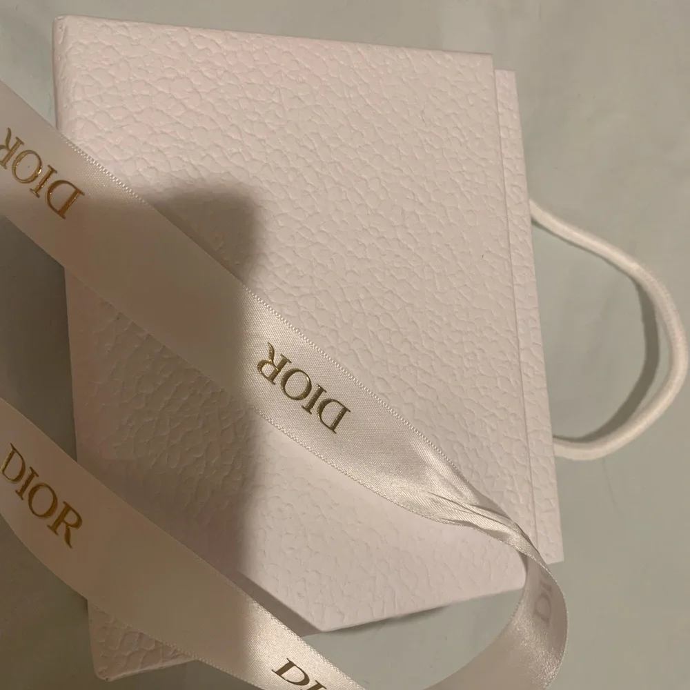 Brand new authentic Dior box textured  with opener compartment. Must have!